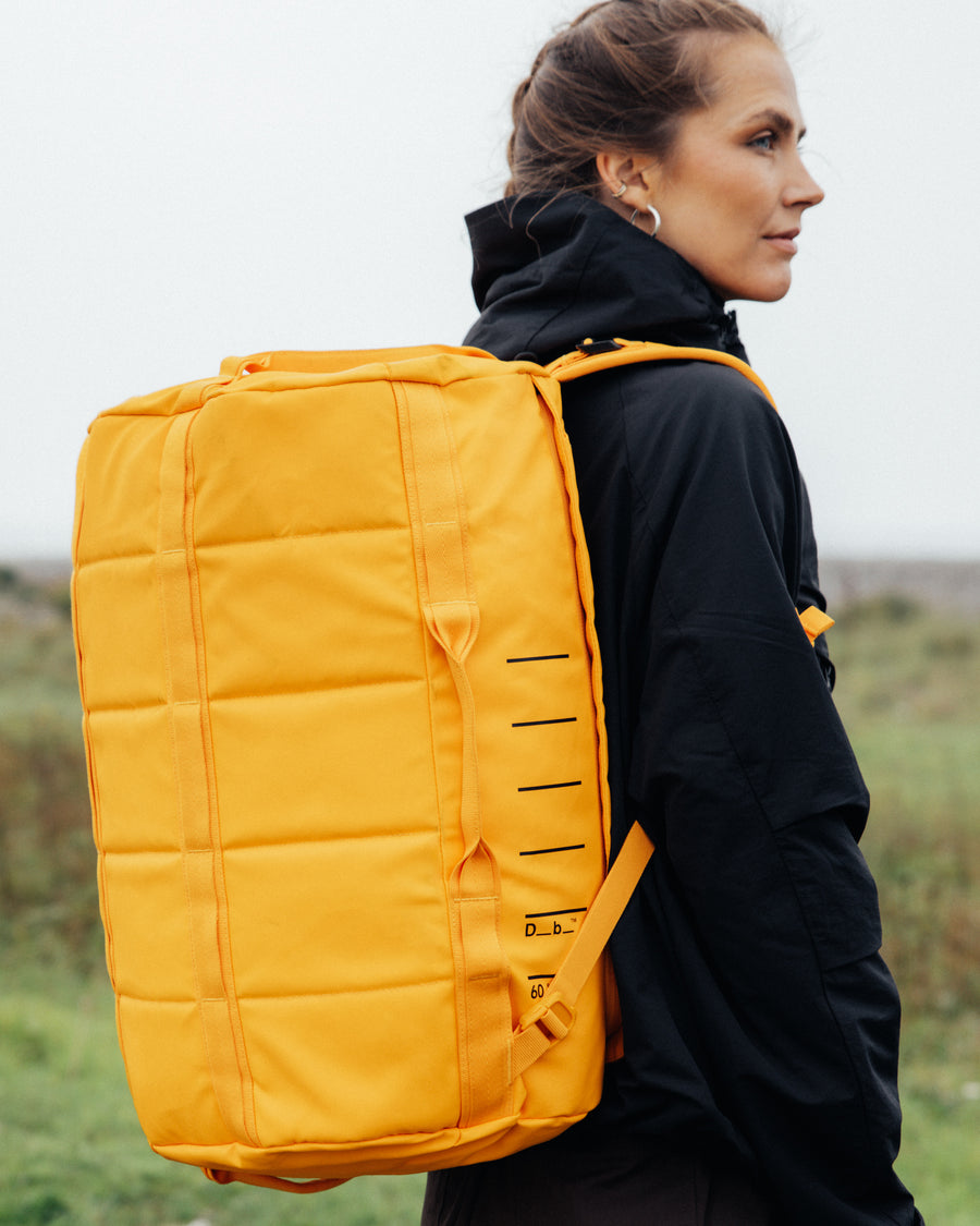 Roamer 60L_Parhelion Orange_on person.jpg